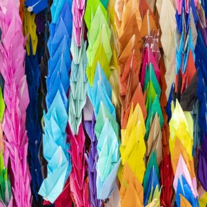 Chains of colourful origami folded paper cranes in Hiroshima, Japan