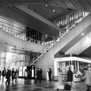 Black and white photo of a busy Osaka Station